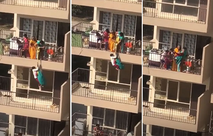 Aşağı Düşen Kıyafeti Alması İçin Çocuğunu Metrelerce Yüksekten Çarşafla Sarkıttı! Aşağı Düşen Kıyafeti Alması İçin Çocuğunu Metrelerce Yüksekten Çarşafla Sarkıttı!